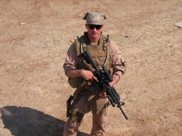 Brett Foley prepares for patrol in Iraq.