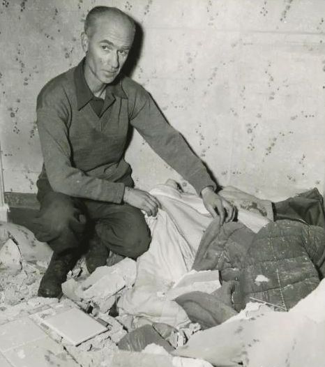 After being woken by anti-aircraft guns, Pyle left his bed early on St. Patrick's Day for a cigarette. Moments later, two German bombs destroyed his apartment. National Archives